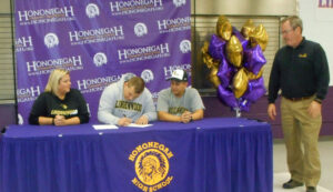 JEAN SEEGERS, PHOTO - The Herald. Blake Zalapi signed a letter of intent on Thursday, Nov. 10, to participate in the wrestling program at Lindenwood University in St. Charles, Mo, next fall. The Hononegah High School Senior has been a member of the wrestling team throughout his high school years, winning several NIC-10 awards. He is seated between his mother Jennifer Zalapi and his father,Vince Zalapi. HHS Athletic Director Steve Cofoid (R) made the announcement. 