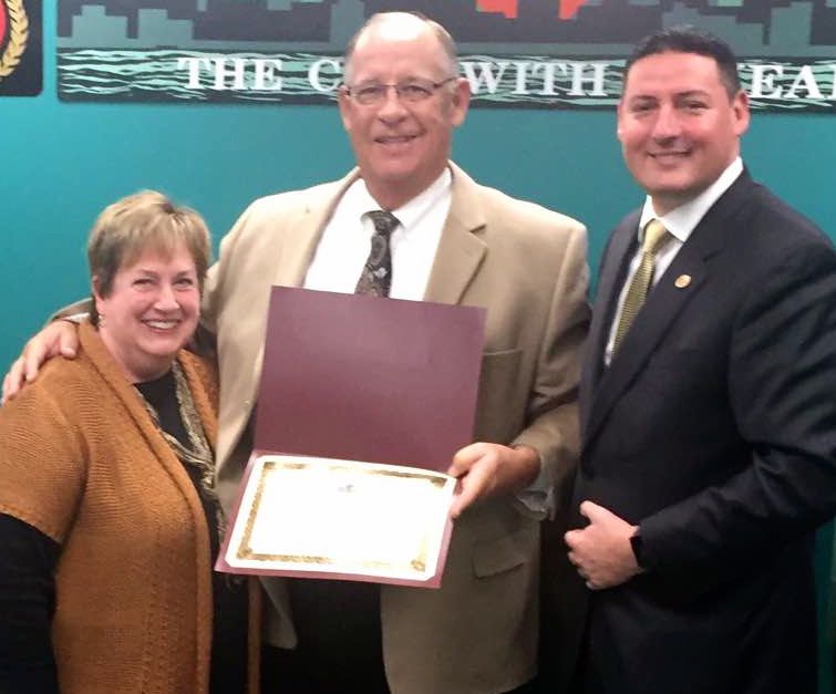 GREG JURY, PHOTO - The Journal. At the Nov. 21 Loves Park City Council meeting, Illinois State Representative John Cabello, 68th District, right, presented an award from the State Assembly to Mayor Darryl Lindberg (pictured with wife Judy). Lindberg was commended for his years of public service. 