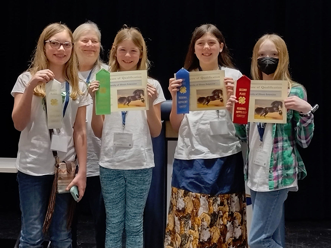 Young ladies compete at 4-H Horse Bowl