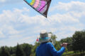 Flyer has a sport kite on a short line to reduce drag during this flight in light wind.