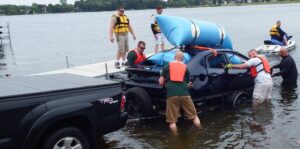 Water rescue teams submerge car for training exercise