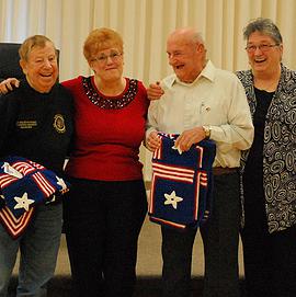 Area crafters donate lapghans for veterans