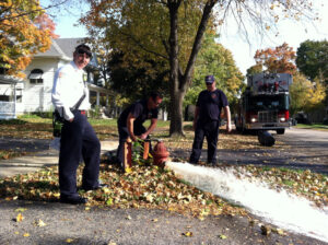 Fire fighters ready city hydrants for winter