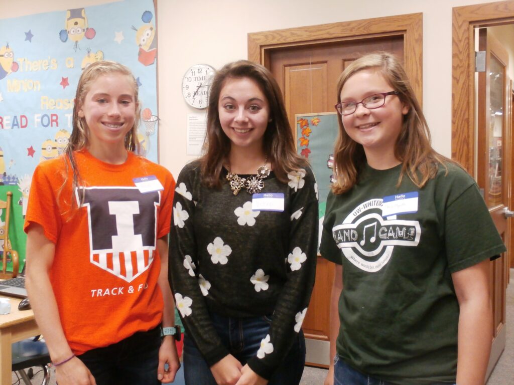 MARIANNE MUELLER, PHOTO - The Herald. Alsiha Rebka, Victoria Sweeny and Abigail Hiroth each spoke about camps attended through camperships awarded by the Hononegah Woman's Club. 