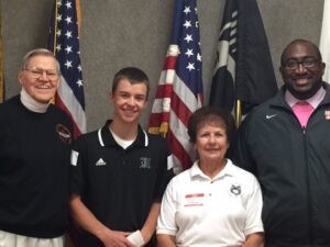 SUBMITTED PHOTO - The Journal Harlemite President, Bill Ryerson, Harlem student, Tanner Elliott, Harlemite Treasurer, Alice Anderson, and HHS Principal, Terrell Yarbough gather for a photo after Tanner told the Harlemites about his Eagle Scout Project. 