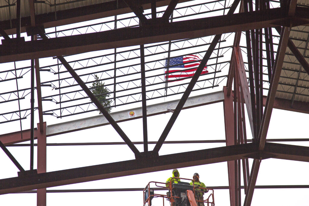 SUBMITTED PHOTO - The Journal. The Rockford Park District, Winnebago County Regional Tourism Facility Board and CORD Construction held a Topping Off Ceremony when CORD Construction placed the last beam on top of the 133,000 square-foot sports building at Mercy Health Sportscore Two, 8800 E. Riverside Blvd., Loves Park. 