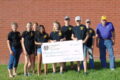 ANNE EICKSTADT PHOTO Belvidere Daily Republican
	The North Boone LEOs, the youth branch of the Capron Lions Club, prepare to present a check for $4000 to Restoring Hope Transplant House.