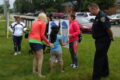 ANNE EICKSTADT PHOTO Belvidere Daily Republican
	The Belvidere Family YMCA provided the ‘Pin the Badge on the Cop’ game and other fun activities for the Summer Lunch Kick Off Party.