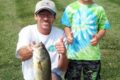 BARB APPELHANS PHOTO Belvidere Republican
	Chuck Hart Lake Management Chair with Julian Stender (Age 3 to 6 group) with his 18 inch Bass.