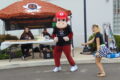 ANNE EICKSTADT PHOTO Belvidere Republican
	The 4-H Flaming Monkeys offered complimentary coffee at the Cars & Coffee for CASA event while their mascot Monkey dances.