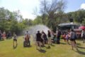 COURTESY PHOTO Belvidere Republican
	Visiting firefighters camp to encourage and splash the kids at MDA Camp this summer.