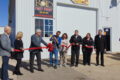 ANNE EICKSTADT PHOTO Belvidere Republican
	Mayor Mike Chamberlain and members of the busi-ness community join Mike and Julie Borowicz in cele-brating the opening of Rite on Time Design’s new Belvidere location.