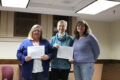 ANNE EICKSTADT PHOTO Belvidere Republican
	Mindy Long, history specialist at the Ida Public Library and Marsha Hosfeld, genealogy expert with Denise Rottmann, seeker of her family tree information at an informal, drop-in genealogy evening.