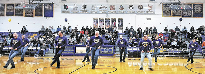 Dancing Dads wow crowd at HHS basketball half-time performance