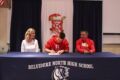 ANNE EICKSTADT PHOTO Belvidere Republican
	Tanner Matteus signs a Letter of Intent to play football for Benedictine University while his parents watch in approval.