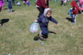 ANNE EICKSTADT PHOTOS Belvidere Republican
	Nicholas Sage, age 4, collects goodies during the Easter Egg Hunt.