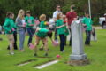 ANNE EICKSTADT PHOTO Belvidere Republican
	The 4-H Grasshoppers decorate the graves of veterans with flowers and flags.