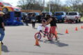 ANNE EICKSTADT PHOTO Belvidere Republican
	Daniella Davis, age 3 ½, goes through the Safety Course on her new bike with the help of her uncle.