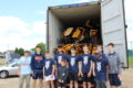 ANNE EICKSTADT PHOTO Belvidere Republican
	School Superintendent Dan Woestman and the Blue Thunder basketball team filled a second ship-ping container (for a total of four this week) on Thurs-day, June 13, to go to Haiti.