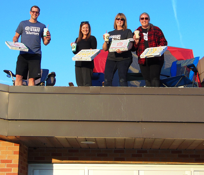 Students exceed fun run goals, Principals camp on roof as reward