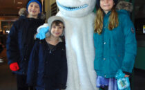 MARIANNE MUELLER PHOTO The Herald
	Ethan, Ellie and Elijah Zingre visited with the Yeti during the 2024 Yeti Fest.