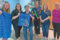 SUBMITTED PHOTO The Gazette
	Pecatonica Rotary Club members pose with Pe-catoncia Elementary School staff to show off some of the items that they now have access to.
