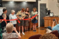 SUBMITTED PHOTO The Gazette
	The Winnebago Community Historical Society and the Winnebago Chamber of Commerce jointly held an open house and ribbon cutting for the new enhancements to the Town Hall. From left: Jan Herbert-Verhaar, Elizabeth Johnson-Lovett, Margaret Bowen, Sherry Bruning, Isaac Bucey, Stephanie King from the Chamber of Commerce, Wanda Cwiklo from the Chamber of Commerce, and (far right) President of the WCHS Irv Koning.
