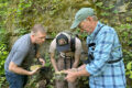 SUBMITTED PHOTO The Herald
	Burpee staff (left) and NLI Executive Director Alan Branhagen (right) looking for fossils.