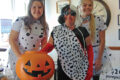 MARIANNE MUELLER PHOTOS The Herald
	Diana Weiser, dressed as Cruella Deville, of DeeDees Coffee and Décor and her employees donned 101 Dalmatian costumes.