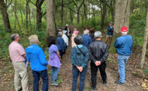 PHOTO COURTESY ROB CLARK The Journal
	Alan Branhagen leads a walk at the Lind-McGeachie Preserve in 2023. This year’s OAKtober Hike will take place at this preserve on Saturday, Oct. 26. Please register for the event.