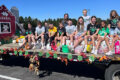 PHOTO COURTESY OF KAITLYN ADAMS Tempo
	During National 4-H Week, club members made a window display, recorded a service announcement at 102.3 the Coyote Radio Station and wore their 4-H shirts to school. They also had a float in the Stillman Valley Fall Festival Parade on Sept. 29.