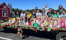 PHOTO COURTESY OF KAITLYN ADAMS Tempo
	During National 4-H Week, club members made a window display, recorded a service announcement at 102.3 the Coyote Radio Station and wore their 4-H shirts to school. They also had a float in the Stillman Valley Fall Festival Parade on Sept. 29.