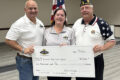 MARIANNE MUELLER PHOTO The Herald
	Marc and Jamie Kuney of the RDM Foundation presented a generous donation in the amount of $5,000  to the Rockton American Legion Post #332 Commander Jim Griffin at the 2024 Veterans Day dinner.