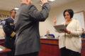 MARIANNE MUELLER PHOTO The Herald
	Rockton Police Chief Matt Hollinger looks on (left, back) as Rockton Village Clerk Christina Stewart (right) swears in new patrol officer Joshua Graham (middle).