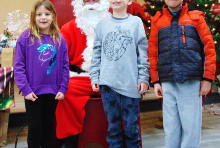 MARIANNE MUELLER PHOTO The Herald
	Adeline, Winston and Wyatt visited with Santa during the Rockton Lions Club Breakfast on Saturday morning.