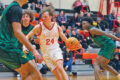 HUSKIE FAN FAVORITES PHOTO The Journal
	Matt Saunders looks for driving room against Waubonsie Valley, Jan. 3, at Harlem. The Huskies fell to the Warriors, 67-39.