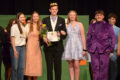 PHOTO COURTESY OF MARDE GANN AND BETTY KENDALL The Gazette
	2025 Mr. PHS Josh Frank (center) with attendant Brooklyn Connell (to his left), 2024 Mr. PHS Drew Lapp (far right), and co-chairs Teagan Kasper (far left) and Anna McLevige (to Frank’s right). Josh also received the Best Answer Award and Mr. Congeniality. Key Club members and co-chairs Teagan and Anna are both juniors this year and have been involved with Mr. PHS for all three of their years of high school so far.