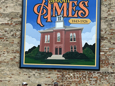 COURTESY PHOTO Belvidere Republican
   The Boone County Arts Council last Saturday dedicated a mural to Sarah J. Ames, considered to be a groundbreaking figure in Boone County’s history. Located at 109 N. State St., Belvidere, the mural was created by Belvidere artist and Everest Satellite High School Principal Mike LaScola. In attendance were current and former law enforcement, as well as members of the Ames family; the mural joins those honoring local legends Fred Schulte and John Lawson.